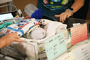 An image of a NICU baby moving to Location G.